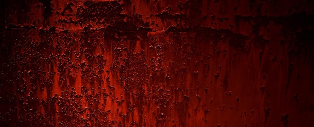 Struttura rossa della parete di lerciume. Sfondo grunge rosso scuro. Trama di cemento horror