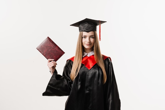 Studente con diploma di laurea abito e berretto pronto a finire il college Futuro leader della scienza Accademico giovane donna in abito nero sorridente