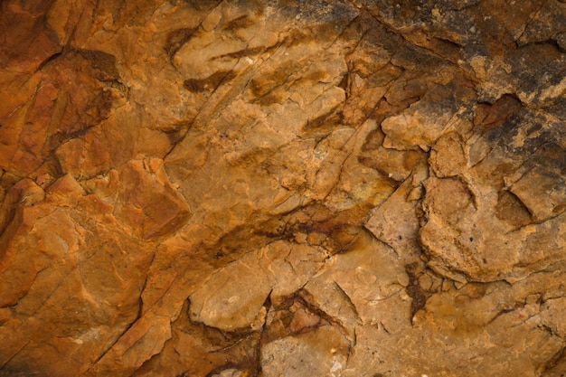 Suite di texture della parete della grotta come sfondo. Priorità bassa di concetto di archeologia.