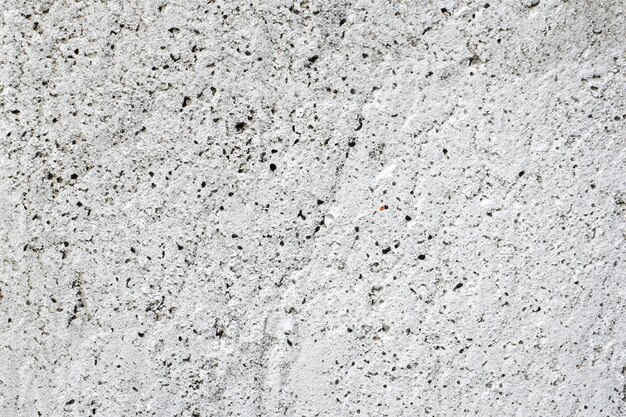 Superficie astratta e texture di parete in pietra di cemento bianco