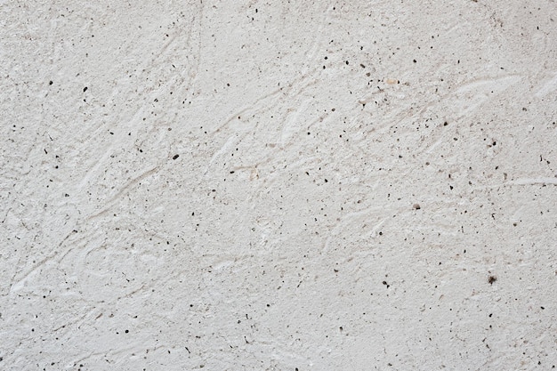 Superficie astratta e texture di parete in pietra di cemento bianco