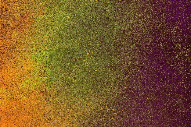 Superficie della parete dipinta di vari colori come texture di sfondo astratto