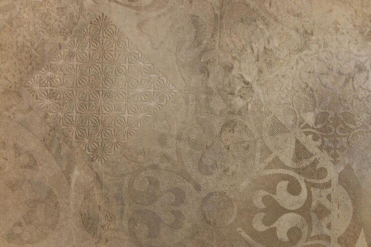 Superficie della parete disordinata del grunge del damasco Struttura decorativa dello stucco