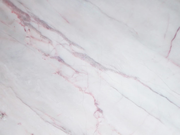 Superficie della trama di marmo di pietra bianca tono rosso e bianco ruvido Utilizzare questo per lo sfondo o l'immagine di sfondo C'è uno spazio vuoto per il concetto di pietra di lusso del testo