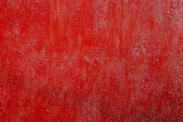 Superficie di metallo arrugginito verniciato rosso ruvido, trama ad alta risoluzione.