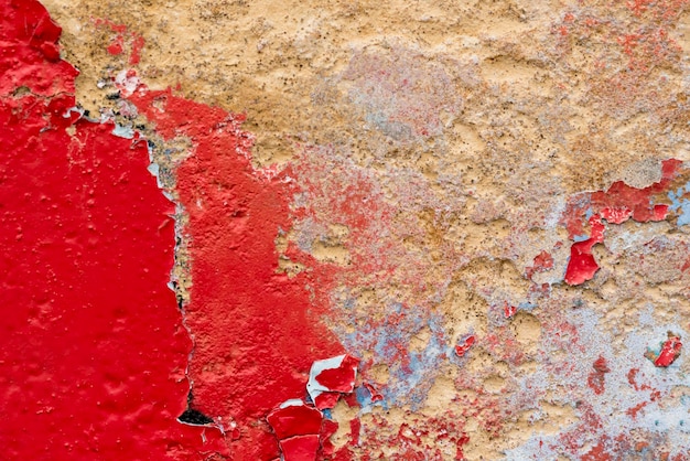 Superficie di pietra con texture di sfondo di vernice rossa incrinata