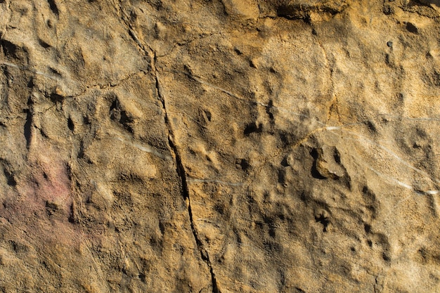 Superficie di roccia naturale o di pietra come consistenza di sfondo