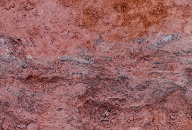 Superficie di strato rosso arancio della roccia per il fondo di struttura