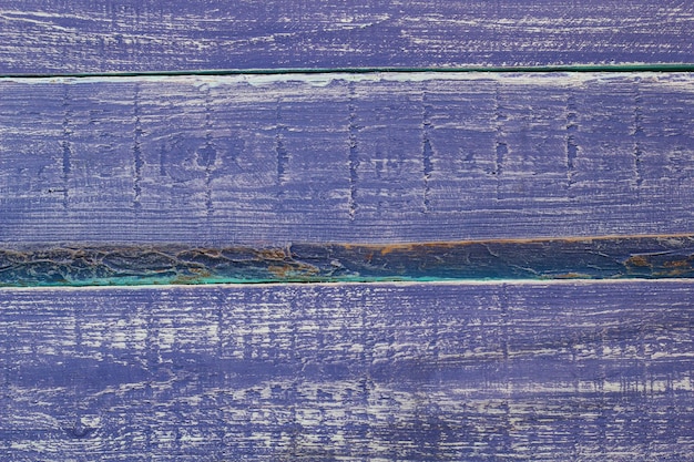 Superficie in legno di colore viola texture o sfondo