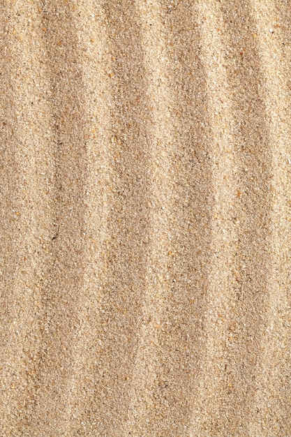 Superficie ondulata astratta della sabbia.