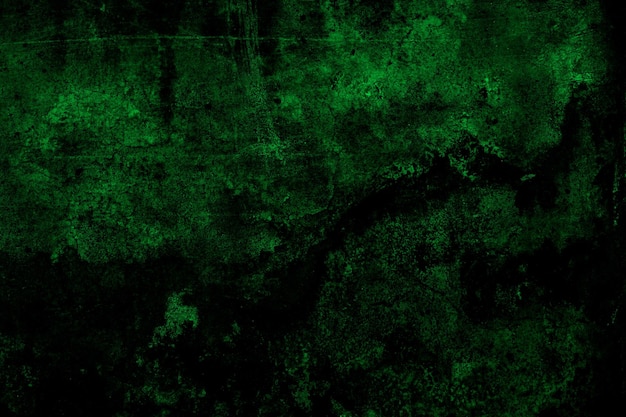 Superficie ruvida testurizzata grunge di colore verde scuro del vecchio muro di cemento abbandonato per lo sfondo