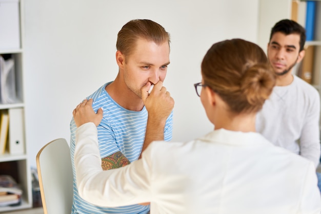 Supporting Patient at Group Therapy Session