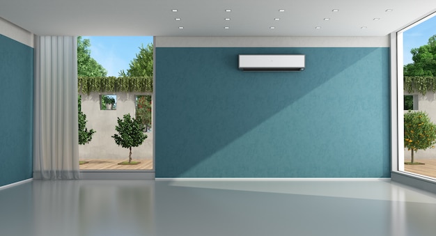 Svuoti l'interno domestico blu con il condizionatore d'aria
