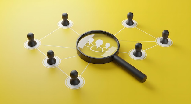 Target audience and customer focus concept A black magnifying glass highlighting a group of people