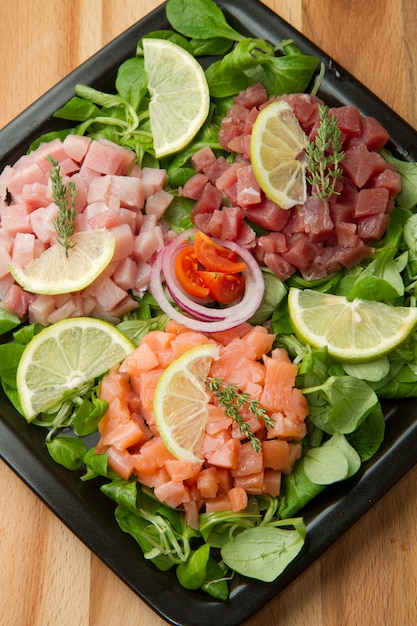 Tartara di salmone, tonno e pesce spada