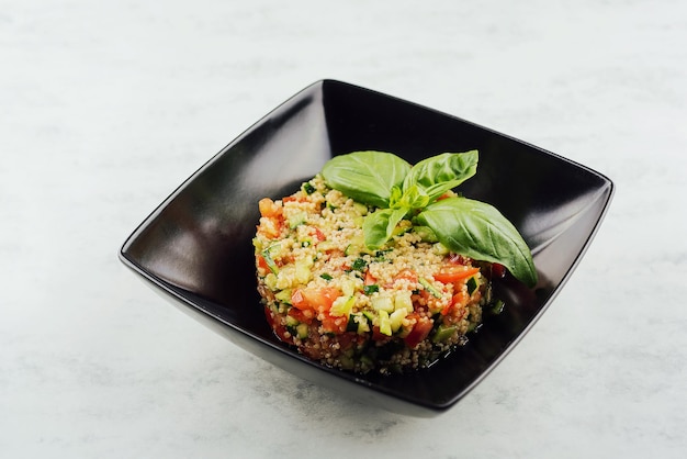 Tartare di cous cous con verdure in banda nera