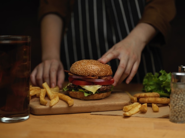 Tasty homemade bacon burger with french fries