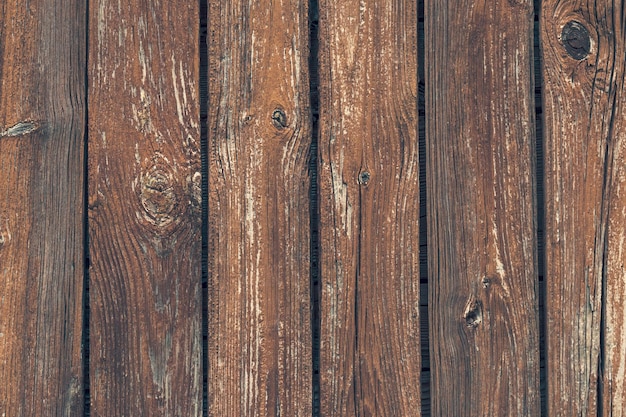 Tavole vecchie incrinate Tavole di legno texture di sfondo Struttura ruvida Pavimento vintage Tavolo in legno marrone scuro sullo sfondo modello in legno Spazio vuoto Stile retrò Recinzione superficie naturale