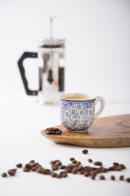 Tazza da caffè tazzina con chicchi di caffè