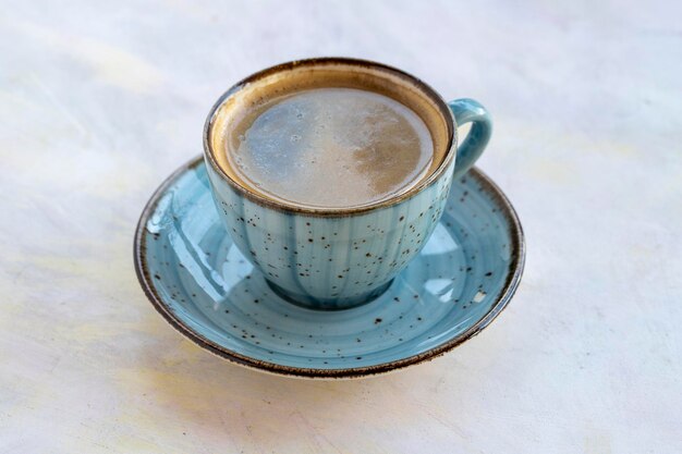 Tazza di caffè Americano sul tavolo di legno