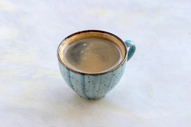 Tazza di caffè Americano sul tavolo di legno