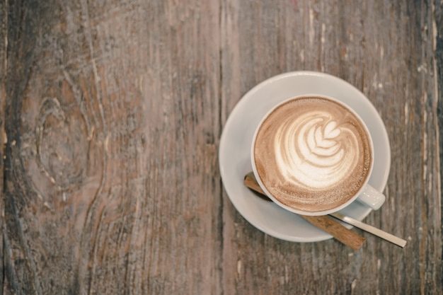 Tazza di caffè con bella arte di Latte