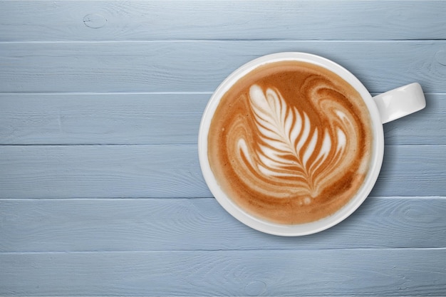 Tazza di caffè su fondo in legno