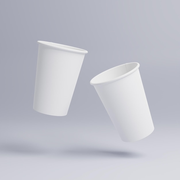 Tazze di caffè in carta bianca mock up su sfondo bianco Coperchio della tazza bianca Due tazze nell'aria dinamica