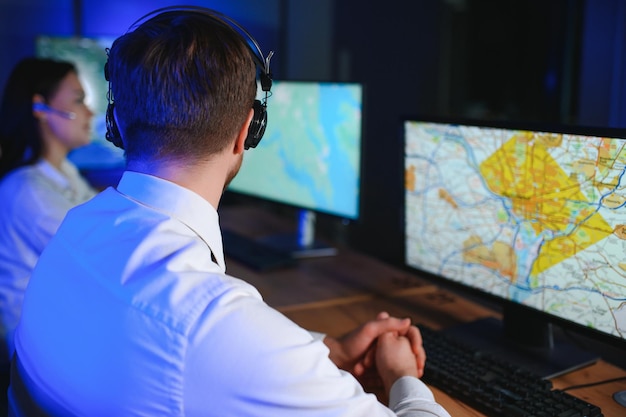 Team of dispatchers works in the office