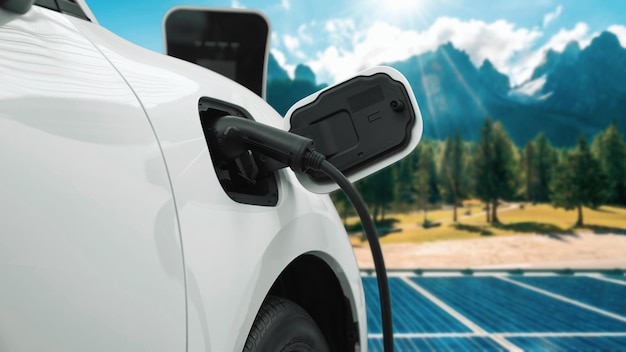 Tecnologia progressiva di energia rinnovabile e pulita di auto elettriche e celle solari