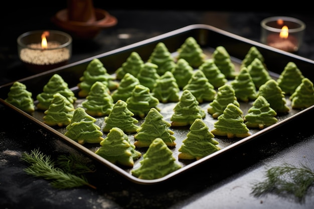 Teglia con pasta cruda a forma di albero di Natale