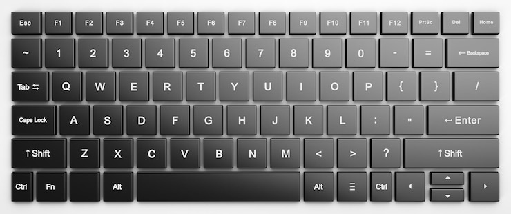 Foto telaio completo della tastiera del computer semplice tasti scuri in una custodia bianca