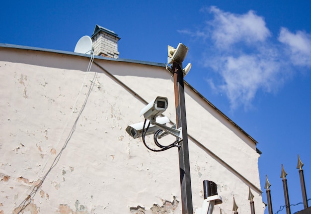 Telecamere di sorveglianza sullo sfondo dell'edificio Telecamere di sorveglianza sicurezza Registrazione video sicurezza degli oggetti