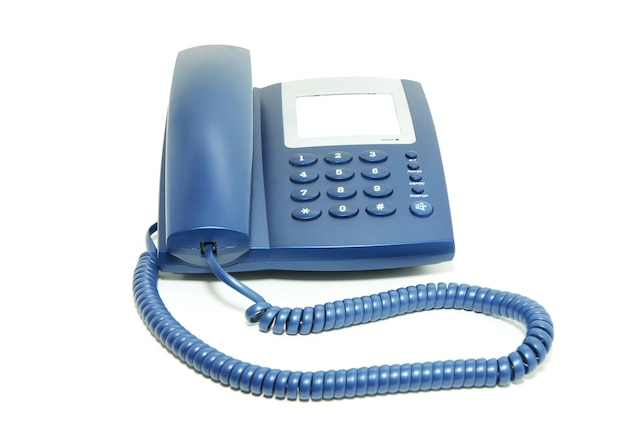 Telefono dell'ufficio blu su sfondo bianco