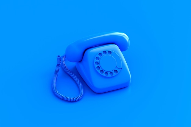 Telefono rotativo retrò blu su sfondo colorato