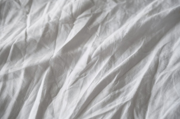 Tessuto di lino bianco rugoso Sfondo di tessuto stropicciato