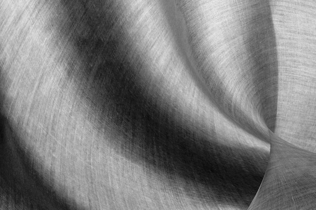 Tessuto di seta bianco elegante liscio o tessuto di lusso satinato per sfondo di design astratto lussuoso drappeggio