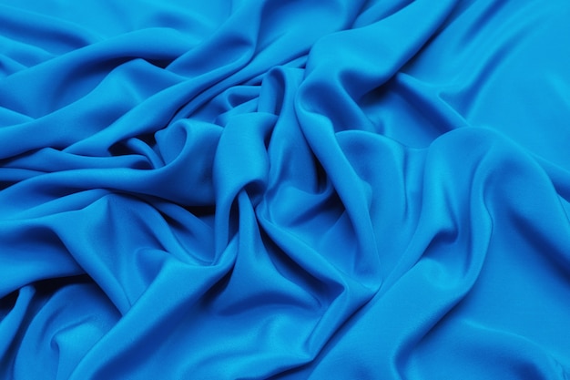 Tessuto di seta, crepe de chine, blu brillante nella disposizione artistica