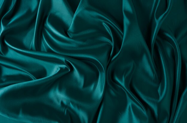 Tessuto di seta tessuto di raso verde ondulato astratto sfondo