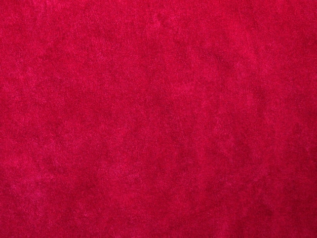 Tessuto di velluto rosso trama utilizzato come sfondo Tessuto rosso vuoto sfondo di materiale tessile morbido e liscio C'è spazio per il testo