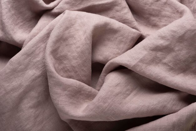 Tessuto in lino stone washed color lilla