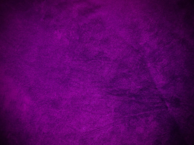 Tessuto in velluto viola utilizzato come sfondo Sfondo vuoto in tessuto viola di materiale tessile morbido e liscio C'è spazio per il testo