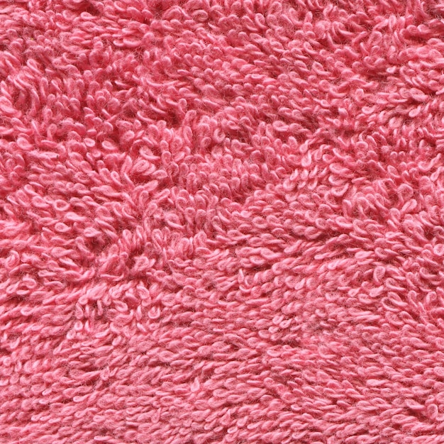 Tessuto rosa tenue dell'asciugamano Tessuto rosa dell'asciugamano Fondo e struttura dell'asciugamano di cotone