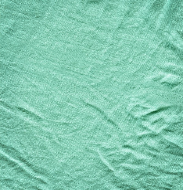 Tessuto turchese texture di sfondo Sfondo turchese da un materiale tessile