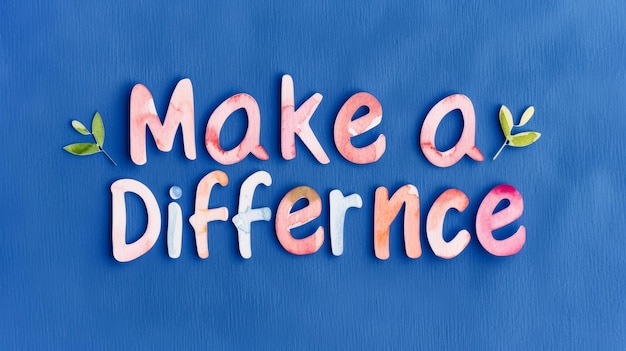 Testo ad acquerello Make a Difference isolato su uno sfondo blu scuro solido
