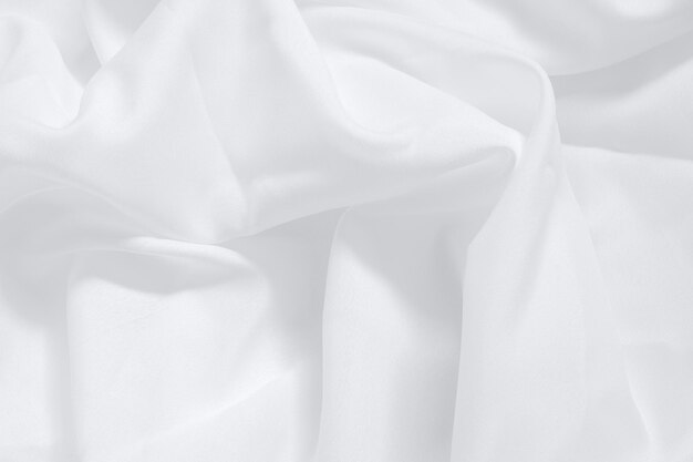 Testo di lino bianco liscio ondulato su sfondo di texture dettagliate