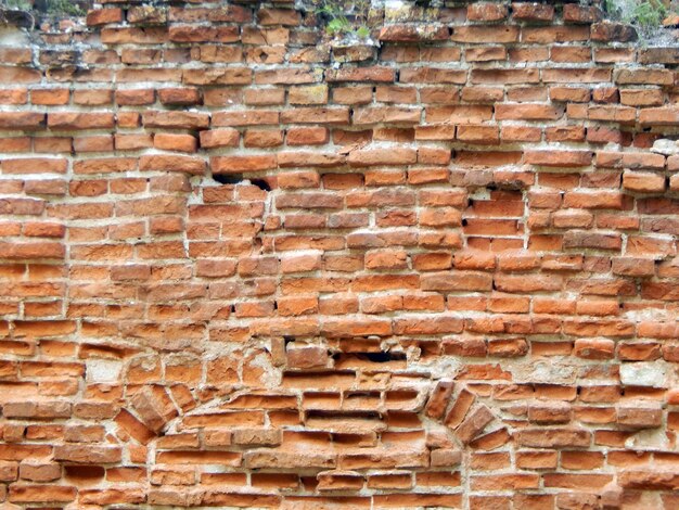 Testura di materiale in pietra naturale e pareti in muratura di mattoni