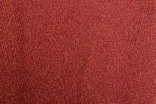 Texture arancia rossa. Tessuto a maglia con motivo