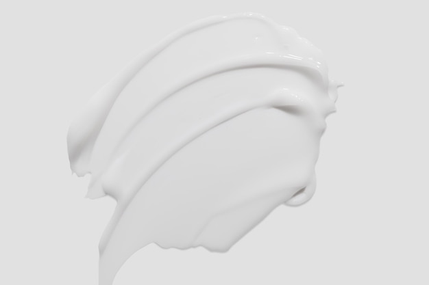 Texture crema di bellezza Lozione bianca idratante per la cura della pelle prodotto cosmetico fondo striscio