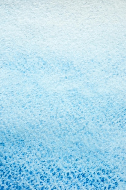 Texture da macchie di acquerello blu su carta bianca